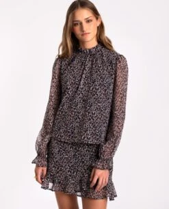 FALDA MANY REASONS · ESTAMPADO -[品牌] Ventas THE-ARE falda corta animal print volantes beige negro volantes conjunto mujer the are 2