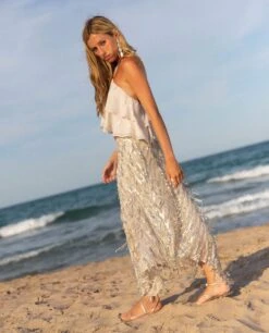 FALDA MOON TAN · DORADO -[品牌] Ventas THE-ARE falda midi estampada lentejuelas doradas bajo asimetrico mujer the are 2