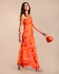 FALDA TERESA · ESTAMPADO -[品牌] Ventas THE-ARE falda midi naranja estampado flores bajo asimetrico conjunto eventos mujer the are eci img 1 scaled