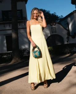 VESTIDO CARLOTA · AMARILLO -[品牌] Ventas THE-ARE vestido largo amarillo gasa tirantes mujer invitada 15 scaled