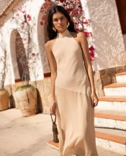 VESTIDO ONA · BEIGE -[品牌] Ventas THE-ARE vestido midi asimetrico beige cuello halter invitada mujer the are 5