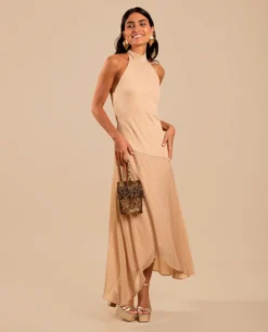 VESTIDO ONA · BEIGE -[品牌] Ventas THE-ARE vestido midi asimetrico beige cuello halter invitada mujer the are eci img 1 scaled